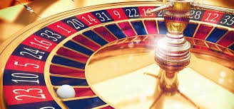 taya774 app on mobile phone showing live casino and sports betting interface for Philippines users